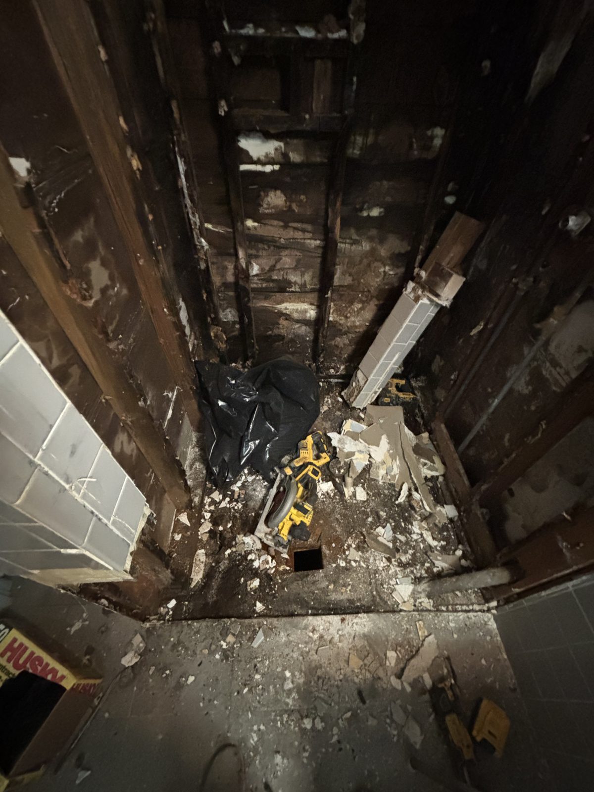 Shower area gutted down to the studs