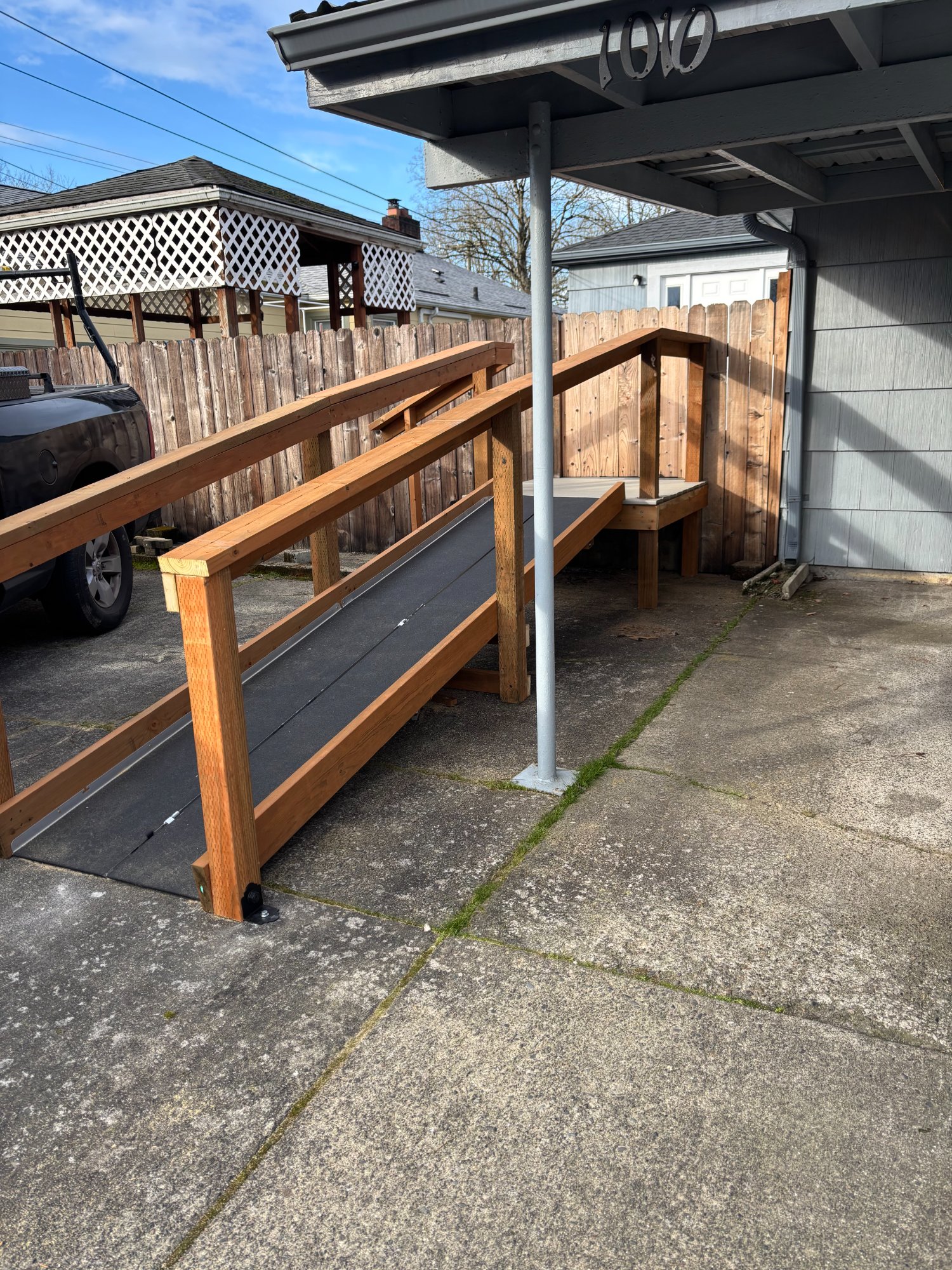 Custom ADA ramp with safety handrails